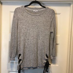 Adorable and soft side tie sweater. Used 3 x. Lrg